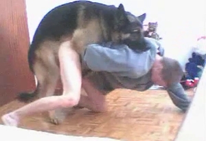 Intense dog is having his way with his kinky owner