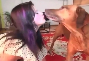 Amateur bestiality video with a zoophile and a brown dog